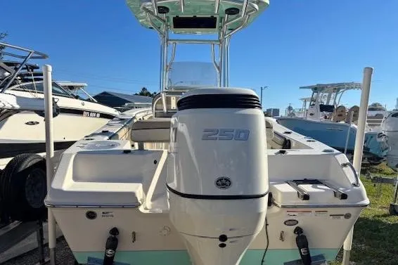 Slide: The Image of 2020 Sea Chaser 22HFC boat with powerful 250 engine, docked under clear blue sky. - 3