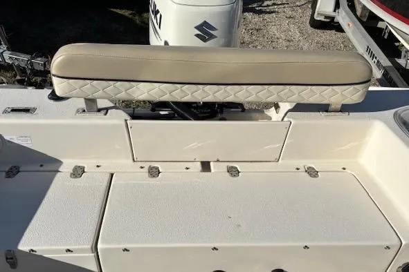 Slide: The Image of 2020 Sea Chaser 22HFC boat with cushioned seating and storage compartments. - 4