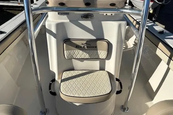 Slide: The Image of 2020 Sea Chaser 22HFC boat interior with cushioned seating and stainless steel railings. - 9