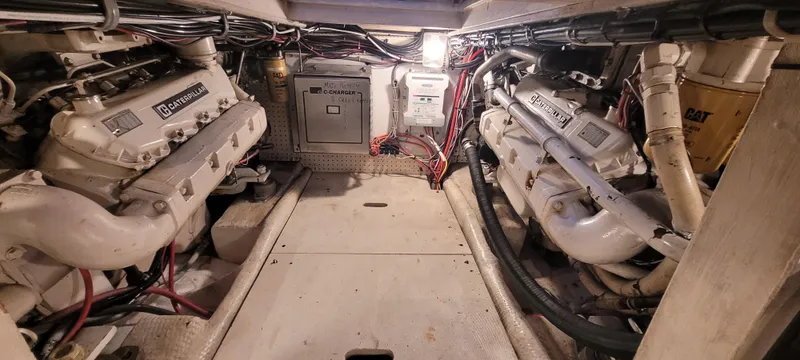 Slide: The Image of Engine room of 1989 Duffy Wilbur 42 Flybridge Cruiser with twin Caterpillar engines. - 39
