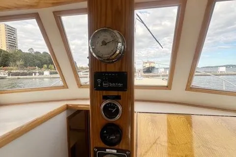Slide: The Image of Interior view of 1989 Duffy Wilbur 42 Flybridge Cruiser with gauges and scenic windows. - 9