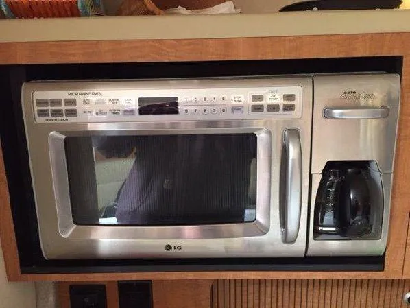 Slide: The Image of LG microwave and coffee maker in 2006 Sea Ray 340 Sundancer. - 10