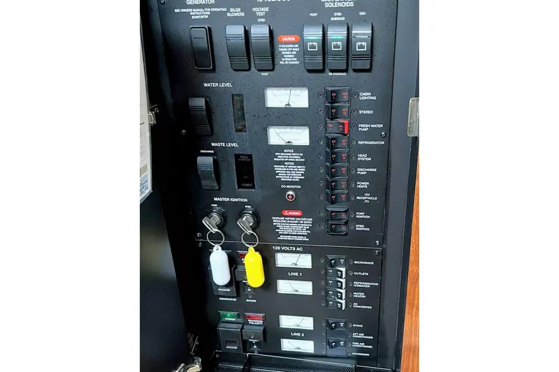 Slide: The Image of Electrical control panel of a 2006 Sea Ray 340 Sundancer boat. - 18