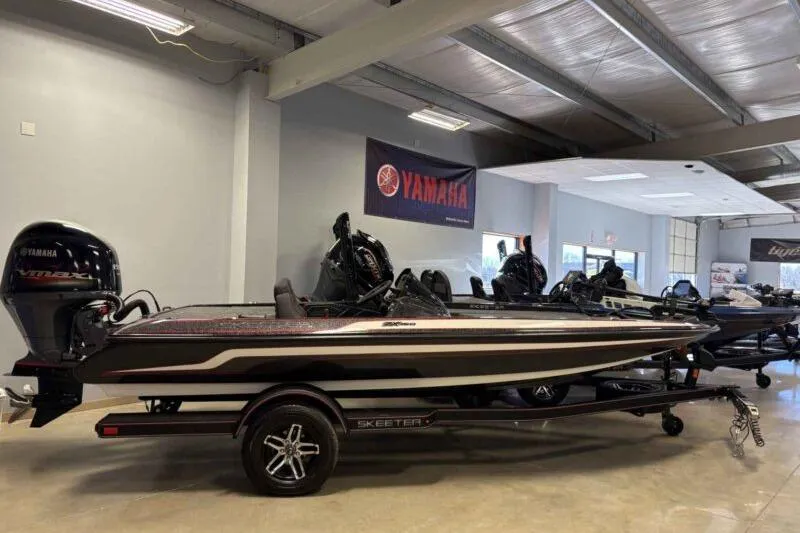 Slide: The Image of 2026 Skeeter ZX150 boat in showroom with Yamaha engine. - 3