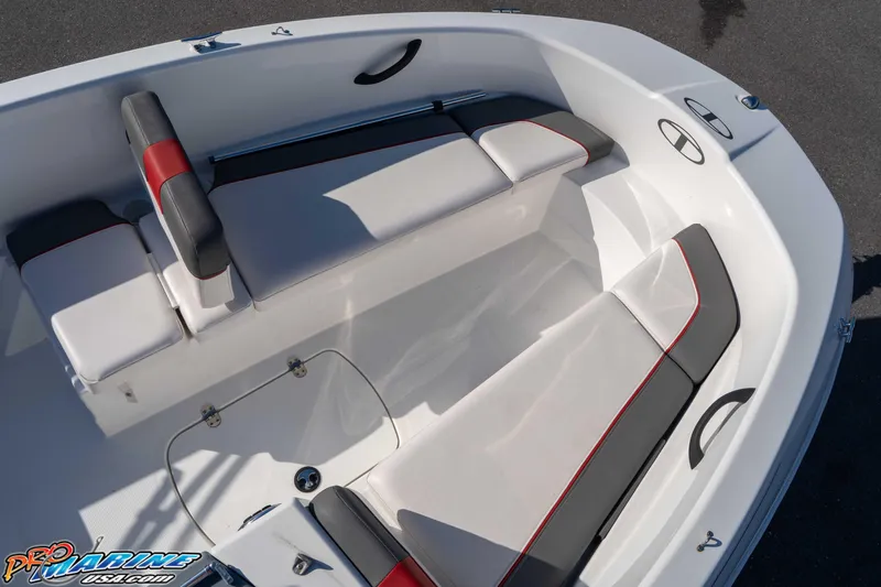 Slide: The Image of 2021 Tahoe T16 boat interior with cushioned seating and storage compartments. - 19