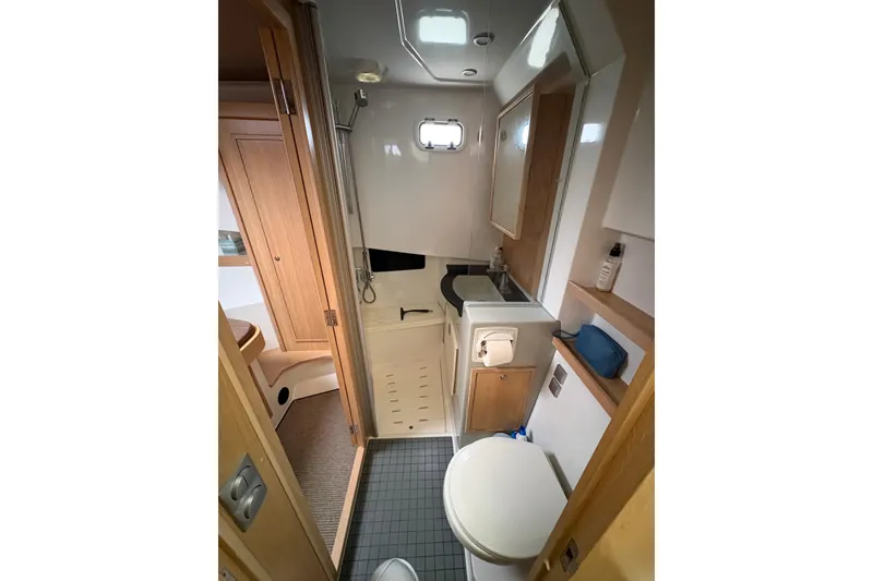 Slide: The Image of 2021 Sargo 36 boat bathroom with modern fixtures and wooden accents. - 24