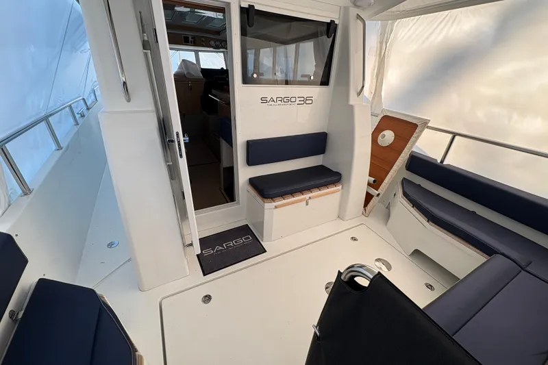 Slide: The Image of Interior view of 2021 Sargo 36 boat with seating and sleek design. - 6