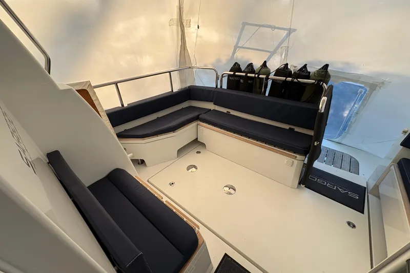 Slide: The Image of Interior of 2021 Sargo 36 boat with navy seating and life jackets. - 9