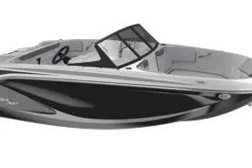 The Image of 2026 Bayliner M17 boat on trailer outside a service center. - 0