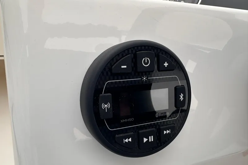 Slide: The Image of Control panel of 2026 Bayliner M17 boat with Bluetooth and audio features. - 22