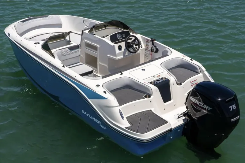 Slide: The Image of 2026 Bayliner M17 boat interior with modern seating and steering console. - 4