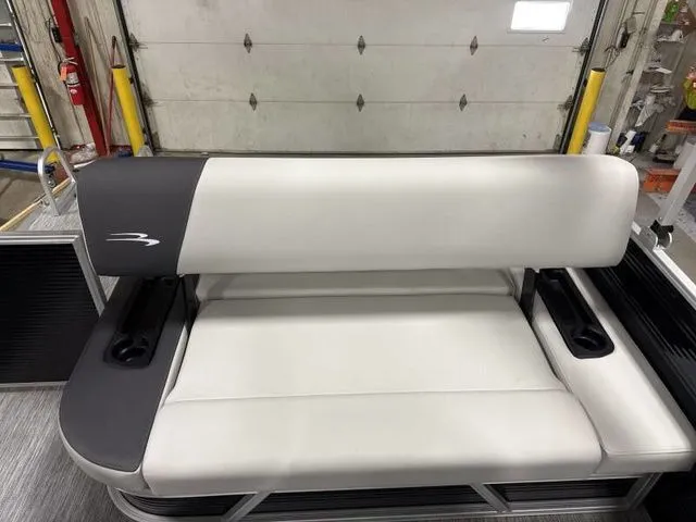 Slide: The Image of 2025 Bennington 22 SSB boat seat in a workshop. - 14