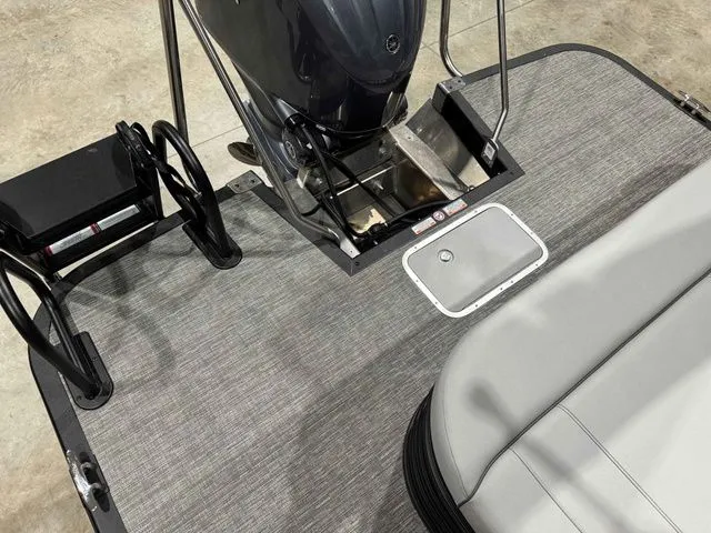 Slide: The Image of 2024 Bennington LXS Series 23 LXSSB boat rear view with motor. - 11