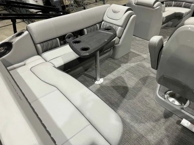 Slide: The Image of Interior of 2024 Bennington LXS Series 23 LXSSB with gray seating. - 13