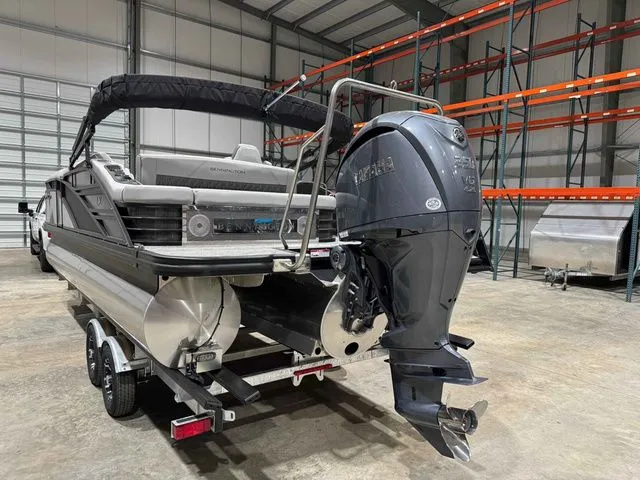 Slide: The Image of 2024 Bennington LXS Series 23 LXSSB pontoon boat in warehouse. - 3