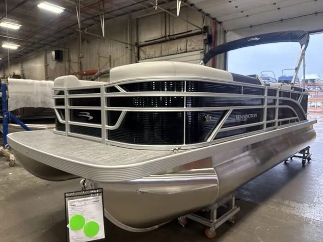 Slide: The Image of Bennington 22 SSR pontoon boat 2026 in a warehouse. - 3