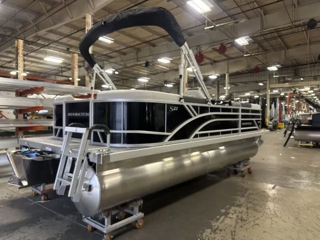 Slide: The Image of Bennington 22 SSR pontoon boat 2026 in a factory setting. - 5