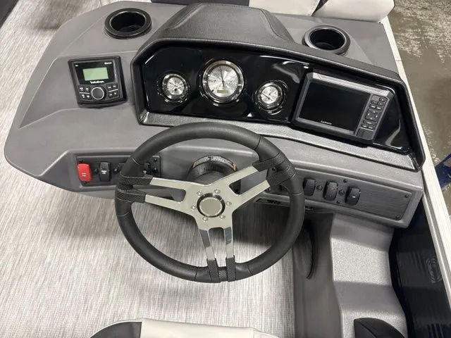 Slide: The Image of Dashboard of 2026 Bennington 22 SSR with steering wheel and instruments. - 7