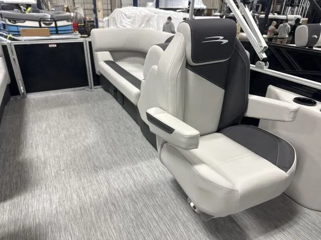 Slide: The Image of Interior of 2026 Bennington 22 SSR with luxurious seating. - 9