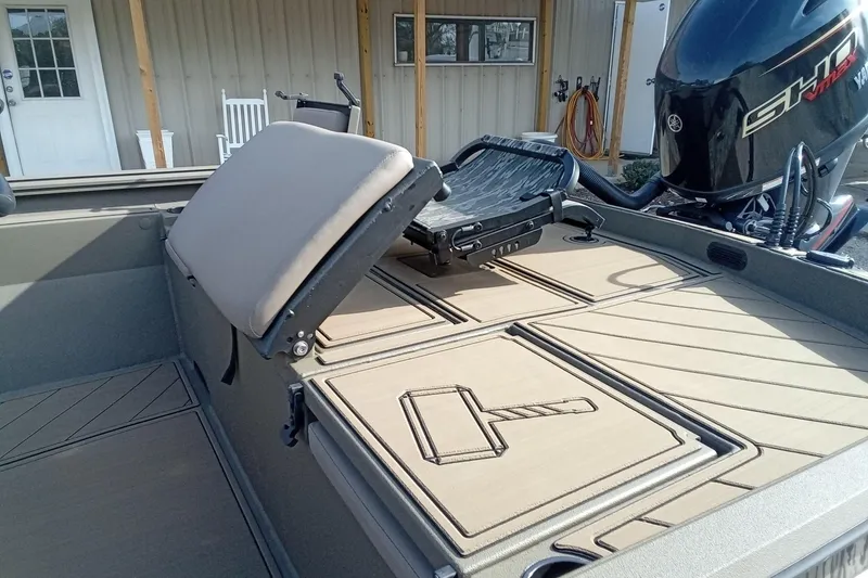 Slide: The Image of 2026 Thor 1900 Low Country Elite boat with Yamaha engine and custom deck design. - 12