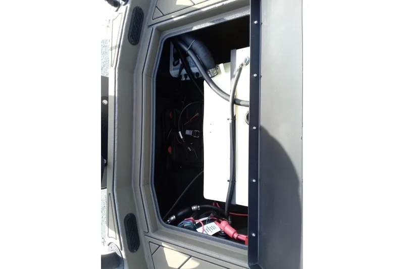 Slide: The Image of Interior view of 2026 Thor 1900 Low Country Elite, showcasing wiring and components. - 18