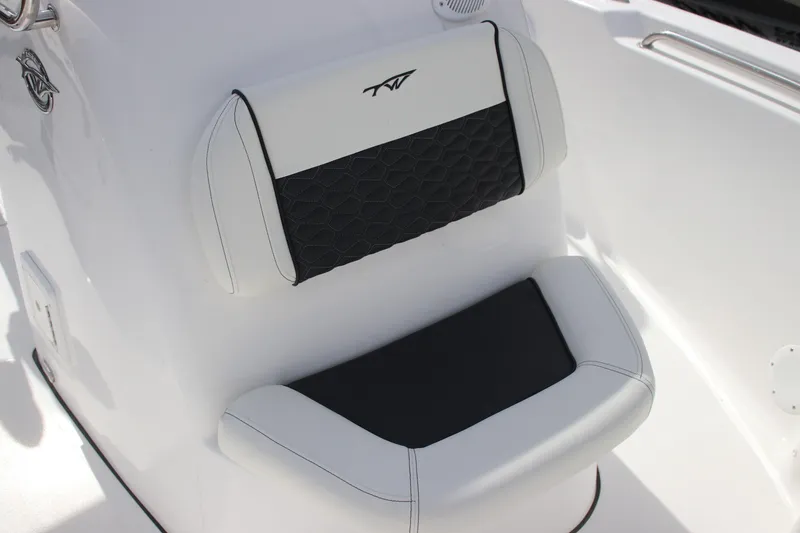 Slide: The Image of 2026 Tidewater 198 CC Adventure boat seat with black and white upholstery. - 26