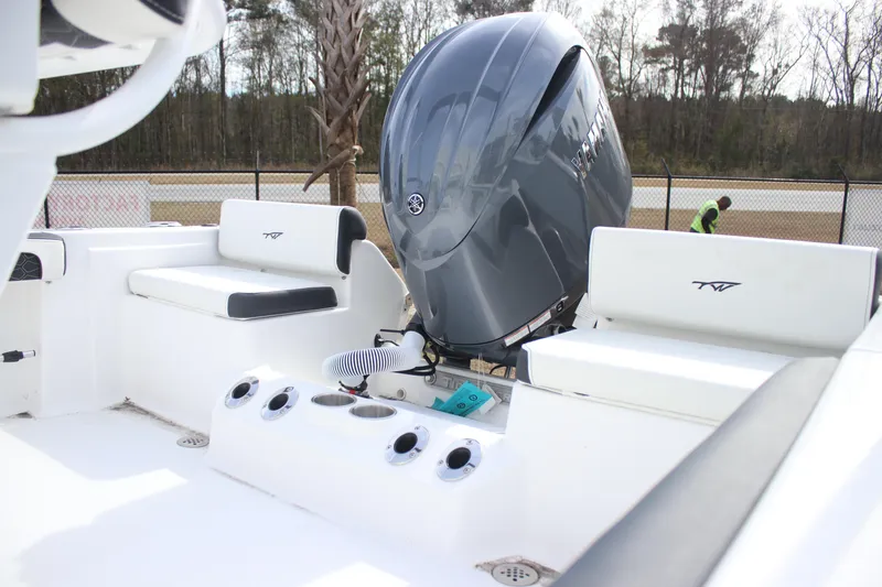 Slide: The Image of 2026 Tidewater 198 CC Adventure boat interior with Yamaha outboard motor. - 5