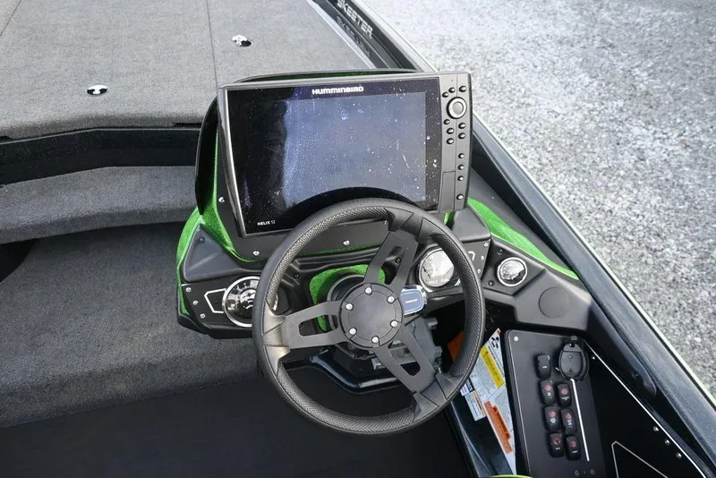 Slide: The Image of 2022 Skeeter ZXR20 boat dashboard with steering wheel and navigation display. - 13