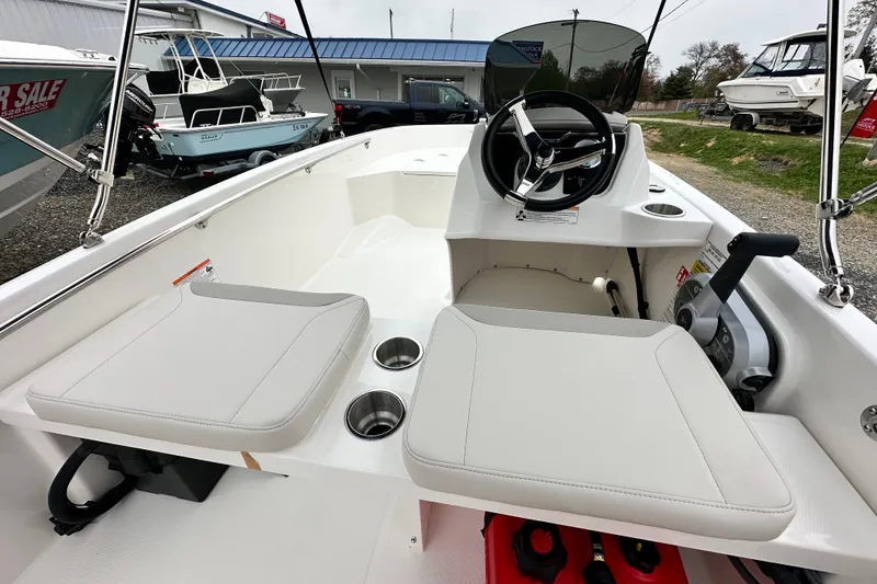 Slide: The Image of Interior view of Boston Whaler 130 Super Sport 2026 boat. - 19