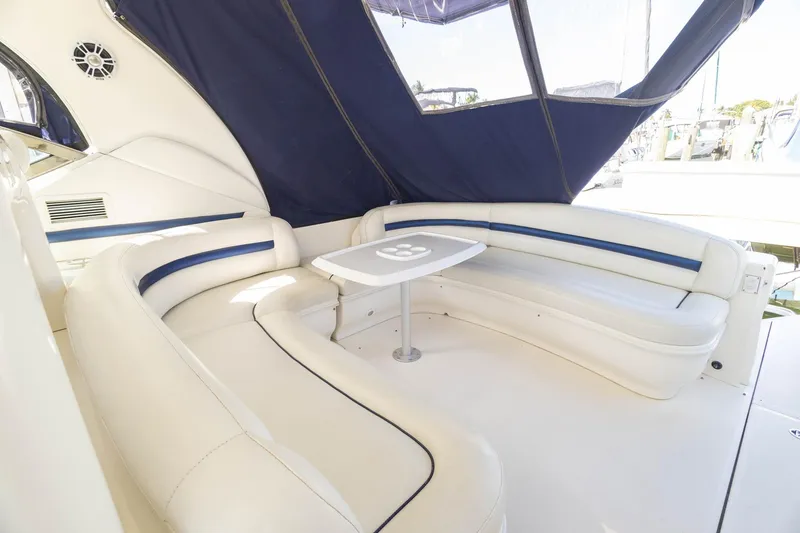 Slide: The Image of Luxurious seating area on 2005 Sea Ray 420 Sundancer yacht with blue accents. - 32