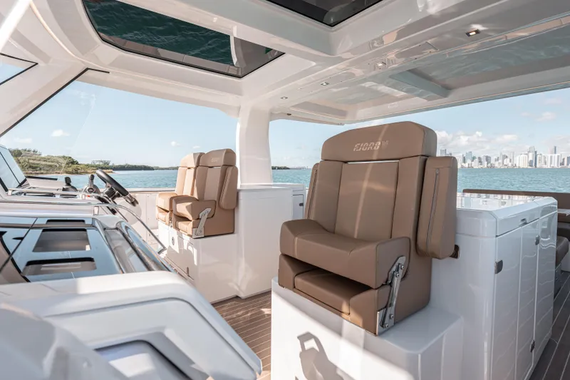 Slide: The Image of Luxurious interior of 2024 Fjord Boats 53XL with panoramic views and plush seating. - 26