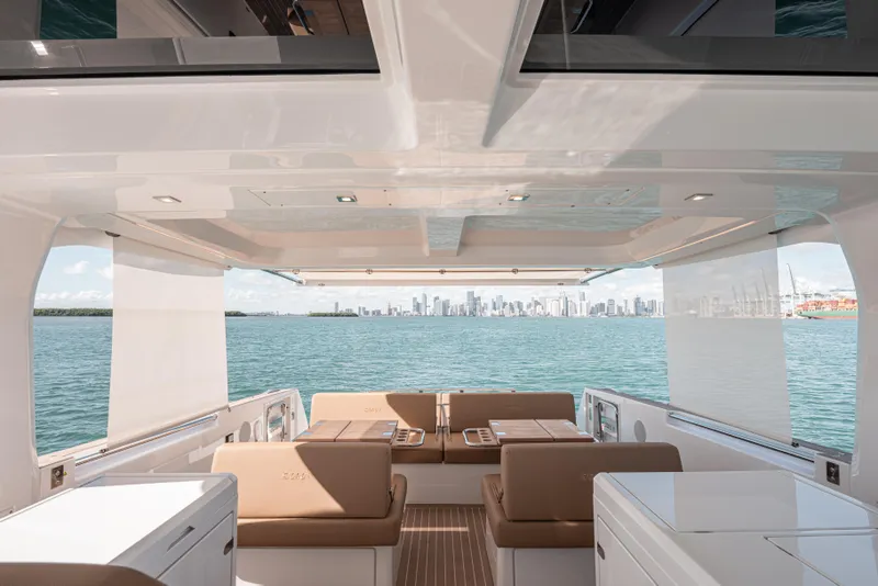 Slide: The Image of 2024 Fjord Boats 53XL interior with city skyline view, featuring modern design and luxury seating. - 28
