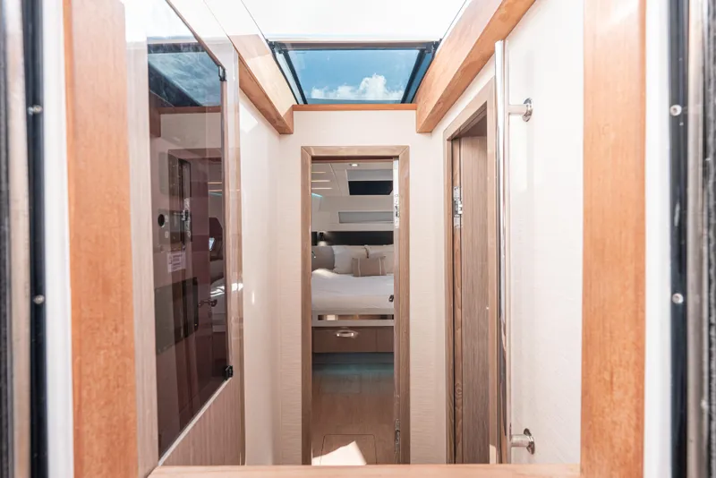 Slide: The Image of Interior view of 2024 Fjord Boats 53XL, featuring a modern cabin design. - 32