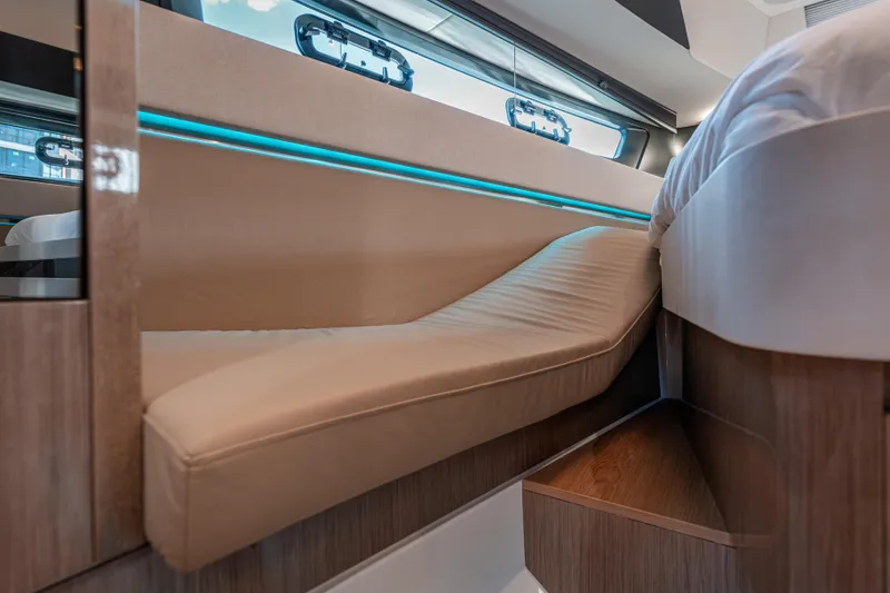 Slide: The Image of Luxurious interior of 2024 Fjord Boats 53XL with modern seating and ambient lighting. - 34