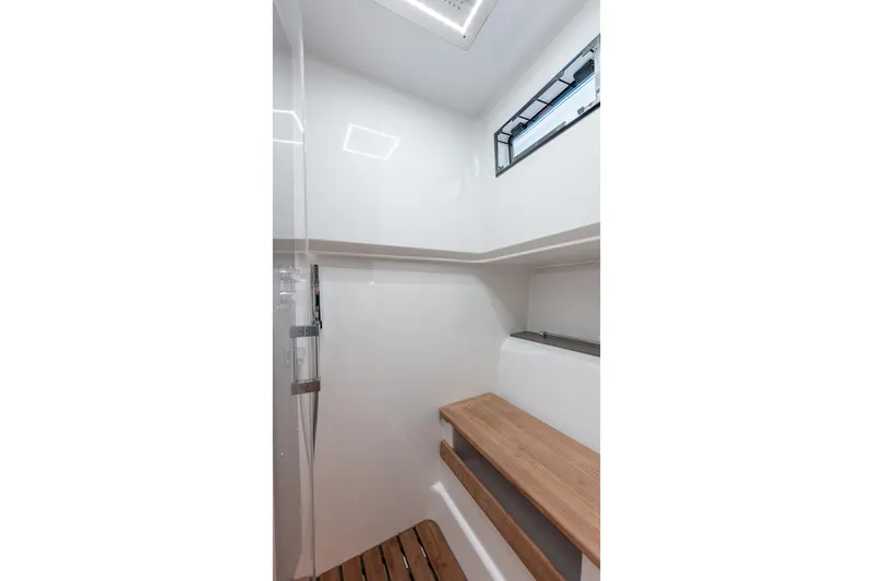Slide: The Image of Modern bathroom interior of 2024 Fjord Boats 53XL with wooden accents and sleek design. - 37