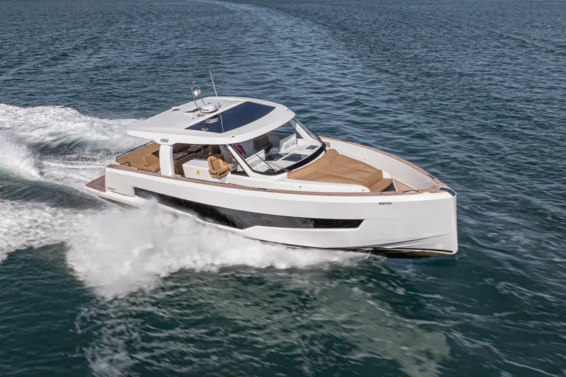 Slide: The Image of 2024 Fjord Boats 53XL cruising on open water, showcasing sleek design and luxury features. - 4
