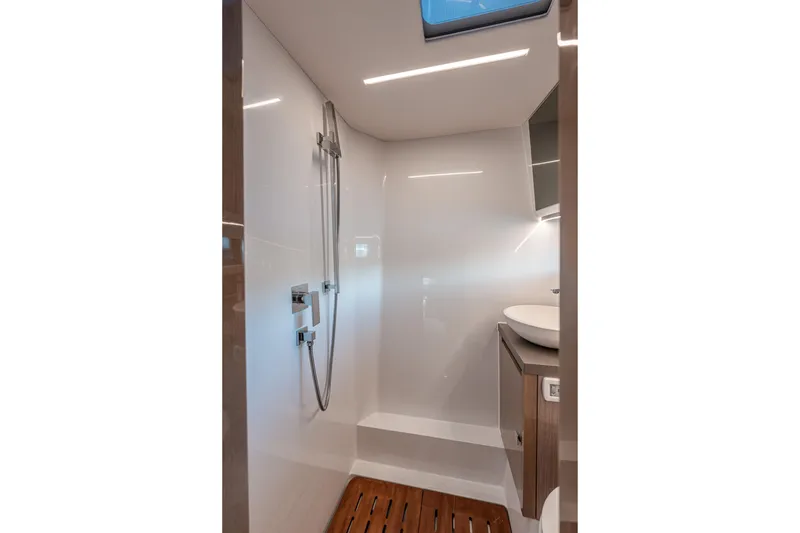 Slide: The Image of Luxurious bathroom in 2024 Fjord Boats 53XL, featuring modern shower and sleek design. - 41