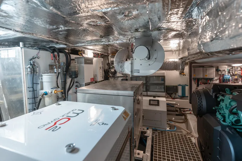 Slide: The Image of Engine room of 2024 Fjord Boats 53XL, showcasing advanced machinery and equipment. - 53