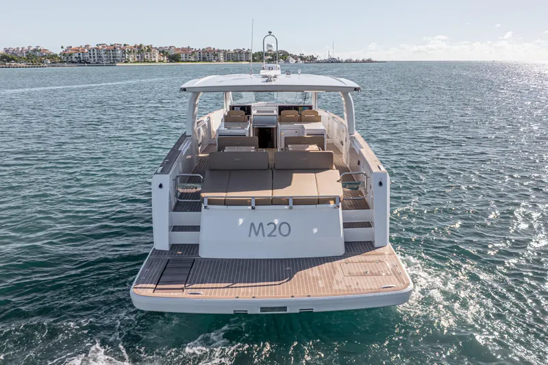 Slide: The Image of 2024 Fjord Boats 53XL luxury yacht cruising on open water. - 9