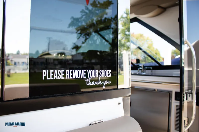 Slide: The Image of Opening Glass Door on the 2016 Regal 42 Coupe - 17