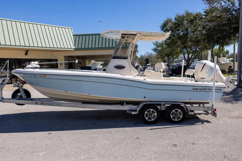 The Image of 2021 Grady-White 251 Coastal Explorer boat on trailer, parked outdoors. - 0