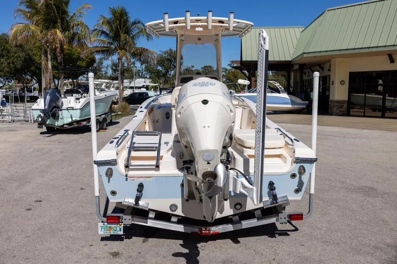 Slide: The Image of 2021 Grady-White 251 Coastal Explorer boat on trailer, parked outdoors. - 3