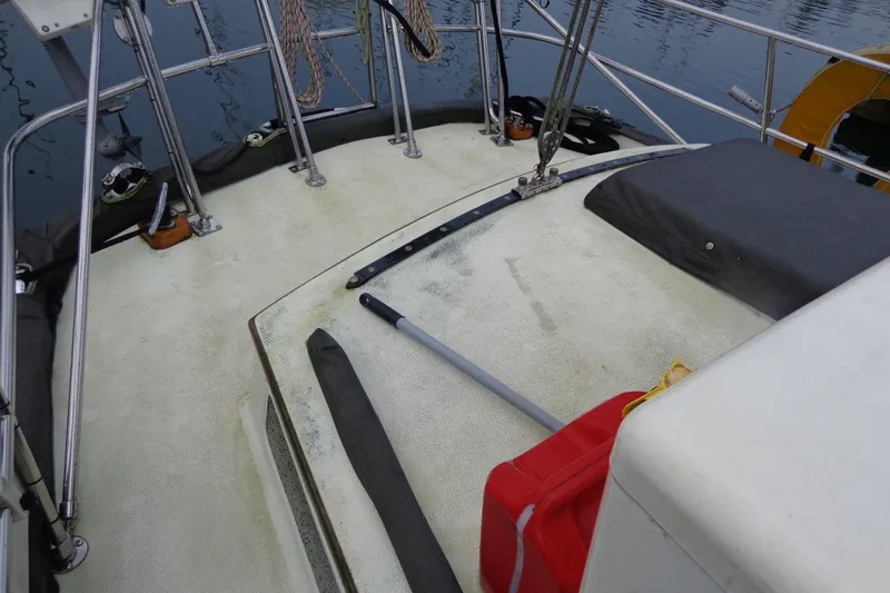 Slide: The Image of 1979 Islander Freeport Center Cockpit Ketch deck with railing and equipment. - 14