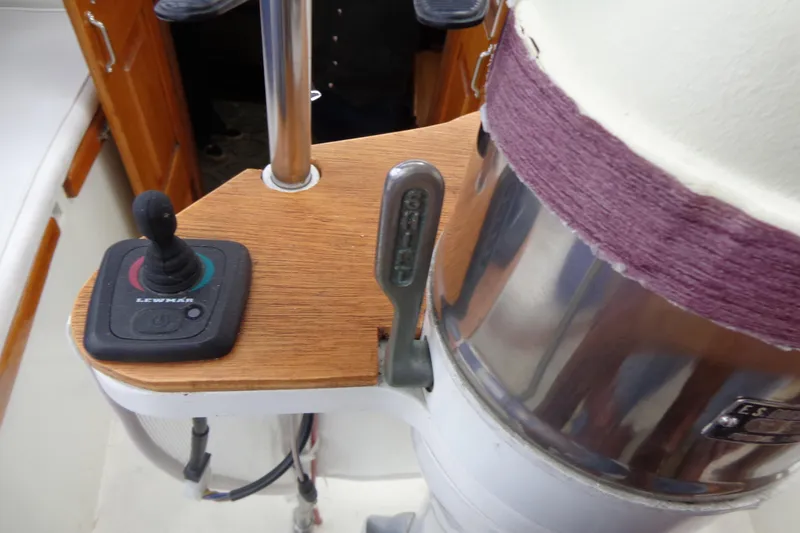 Slide: The Image of Cockpit controls of 1979 Islander Freeport Center Cockpit Ketch, featuring Lewmar joystick. - 28