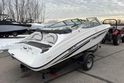 Slide: The Image of 2017 Yamaha Boats SX190 on trailer, parked outdoors with snow in background. - 3