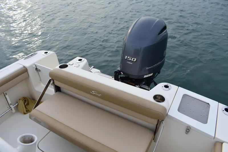 Slide: The Image of 2020 Scout 215 XSF boat with Yamaha 150 engine on water. - 19