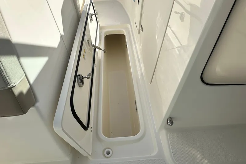 Slide: The Image of Storage compartment in Boston Whaler 240 Vantage 2026 boat. - 14