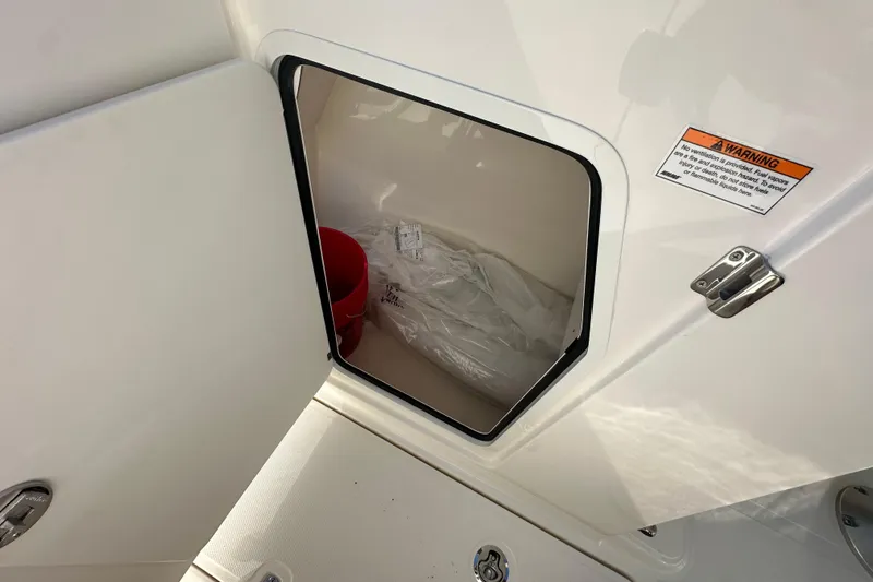 Slide: The Image of Storage compartment in Boston Whaler 240 Vantage 2026 boat. - 15