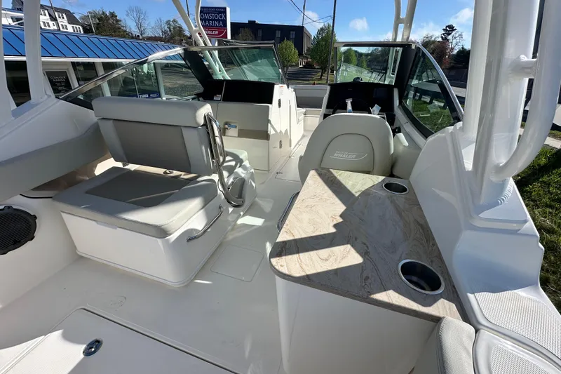 Slide: The Image of Interior of 2026 Boston Whaler 240 Vantage with seating and helm console. - 33
