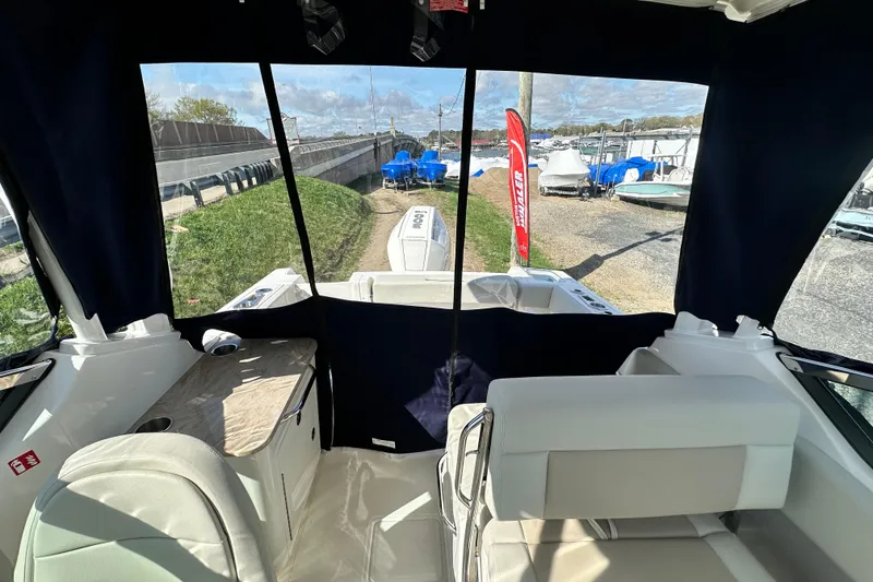 Slide: The Image of Interior view of 2026 Boston Whaler 240 Vantage with harbor view. - 45